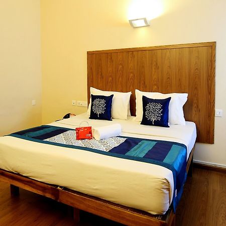 Oyo 2887 Hotel Sn International Kumily Bagian luar foto