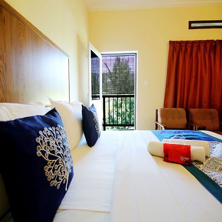 Oyo 2887 Hotel Sn International Kumily Bagian luar foto